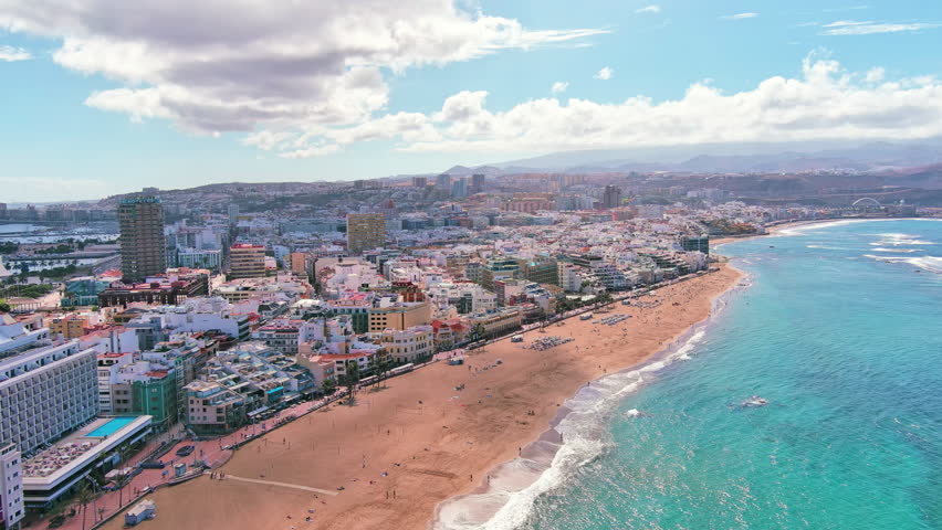 Las Palmas de Gran Canaria, Canary Islands, Spain: Aerial view of one of capital cities of Canary Islands, famous beach Playa de Las Canteras - landscape panorama of  Atlantic Ocean islands from above