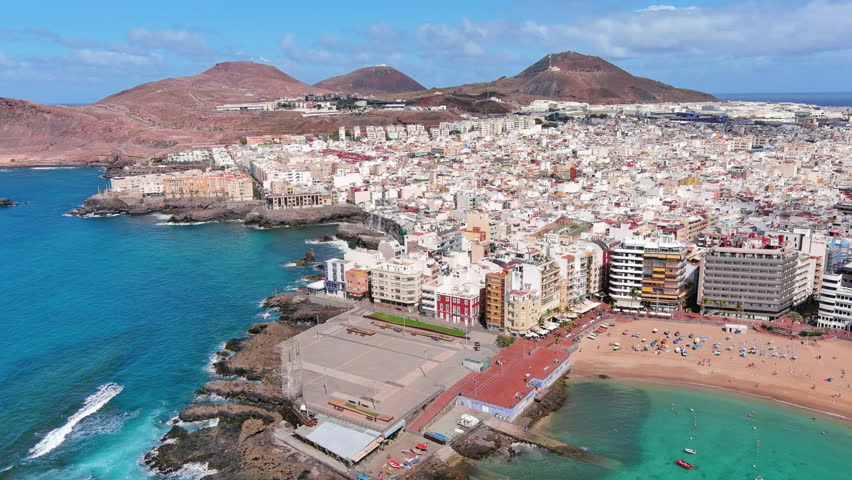 Las Palmas de Gran Canaria, Canary Islands, Spain: Aerial view of one of capital cities of Canary Islands, famous beach Playa de Las Canteras - landscape panorama of  Atlantic Ocean islands from above