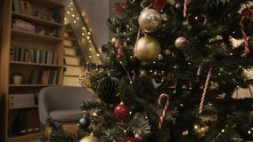 A detailed 4K view of a decorated Christmas tree with wrapped gifts underneath, representing a popular holiday tradition. - Powered by Shutterstock - Get 15% off with code: PIKWIZARD15