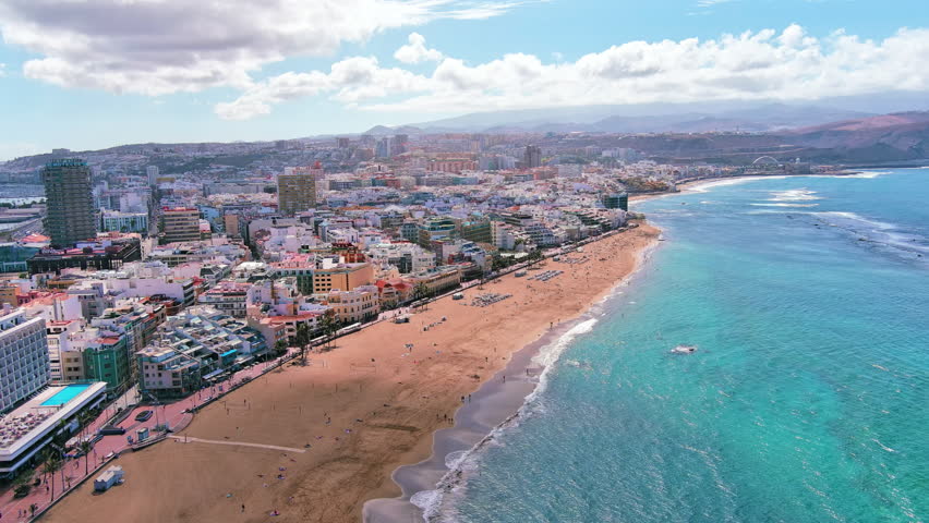 Las Palmas de Gran Canaria, Canary Islands, Spain: Aerial view of one of capital cities of Canary Islands, famous beach Playa de Las Canteras - landscape panorama of  Atlantic Ocean islands from above