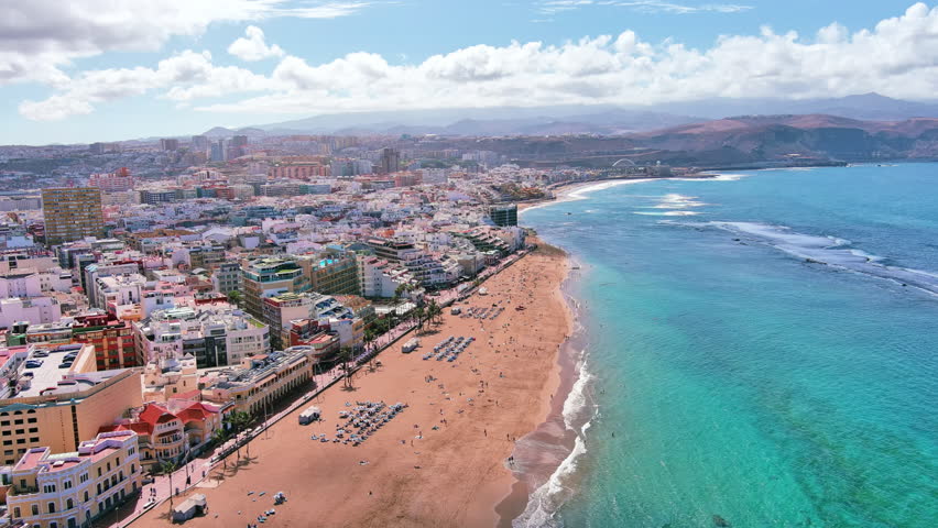 Las Palmas de Gran Canaria, Canary Islands, Spain: Aerial view of one of capital cities of Canary Islands, famous beach Playa de Las Canteras - landscape panorama of  Atlantic Ocean islands from above