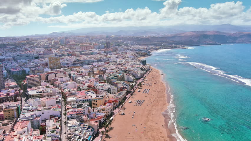 Las Palmas de Gran Canaria, Canary Islands, Spain: Aerial view of one of capital cities of Canary Islands, famous beach Playa de Las Canteras - landscape panorama of  Atlantic Ocean islands from above