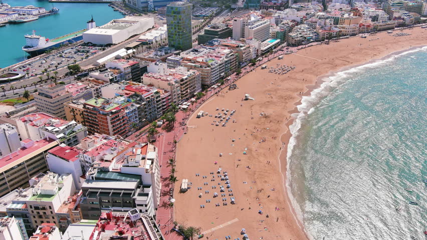 Las Palmas de Gran Canaria, Canary Islands, Spain: Aerial view of one of capital cities of Canary Islands, famous beach Playa de Las Canteras - landscape panorama of  Atlantic Ocean islands from above