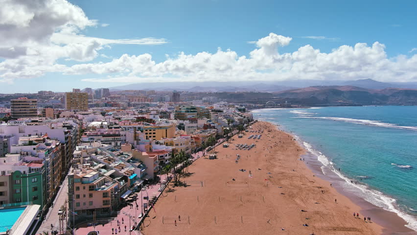 Las Palmas de Gran Canaria, Canary Islands, Spain: Aerial view of one of capital cities of Canary Islands, famous beach Playa de Las Canteras - landscape panorama of  Atlantic Ocean islands from above