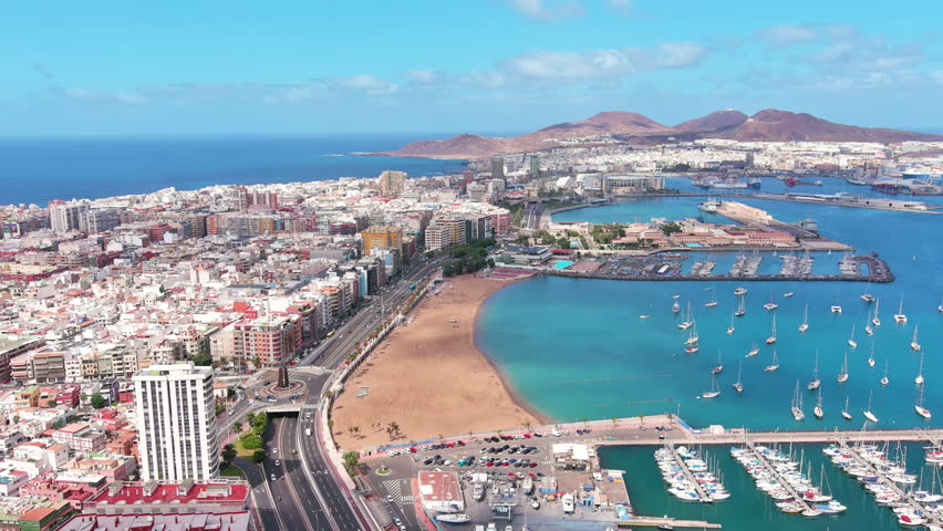 Las Palmas de Gran Canaria, Canary Islands, Spain: Aerial view of one of capital cities of Canary Islands, beach Playa de Las Alcaravaneras - landscape panorama of  Atlantic Ocean islands from above