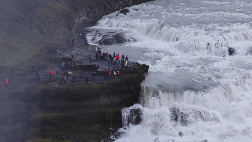 The spectacular aerial view of Gullfoss waterfall in Iceland. Water cascades over the rocks at Gulfoss Waterfall - one of the most popular waterfalls in Iceland. 