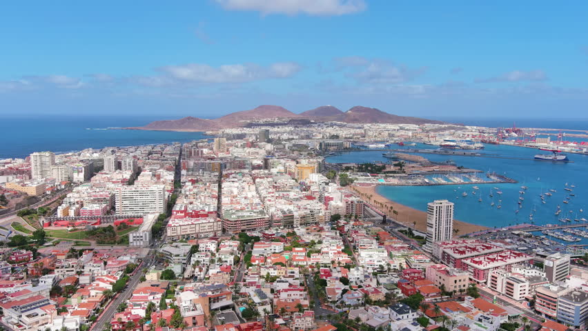 Las Palmas de Gran Canaria, Canary Islands, Spain: Aerial view of one of capital cities of Canary Islands, beach Playa de Las Alcaravaneras - landscape panorama of  Atlantic Ocean islands from above