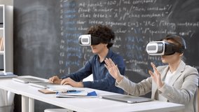 Young students exploring tactile sensations with virtual reality in a bright classroom, highlighting interactive learning, technology in education, and VR experiences. - Powered by Shutterstock - Get 15% off with code: PIKWIZARD15