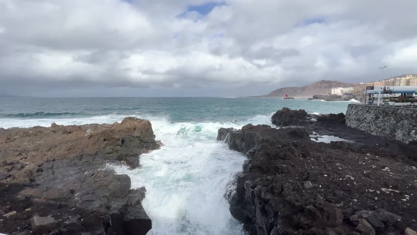 Big waves at rocky coast in las palmas de gran canaria