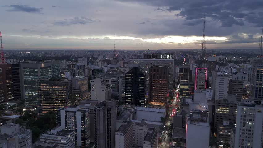 Illuminated Buildings In the Financial District Of São Paulo In Brazil At Night. - aerial shot