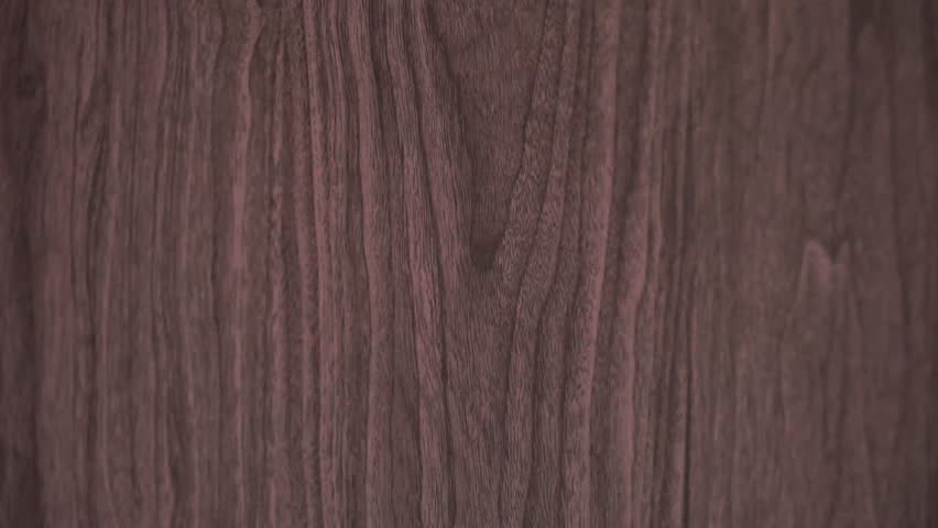 A human hand touched the surface of the wooden door. It seemed hesitant to knock, but eventually opened the door.