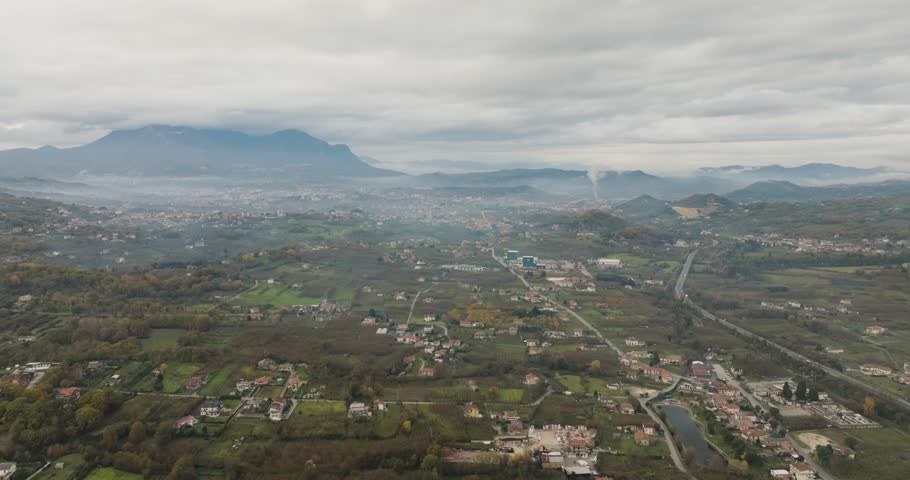 Aerial view of landscape with mountains, Italy.