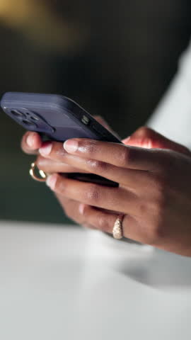 Hands, phone and texting at office, night and scroll on mobile app for notification at media company. Person, journalist and smartphone with chat, typing or contact for story lead at creative agency