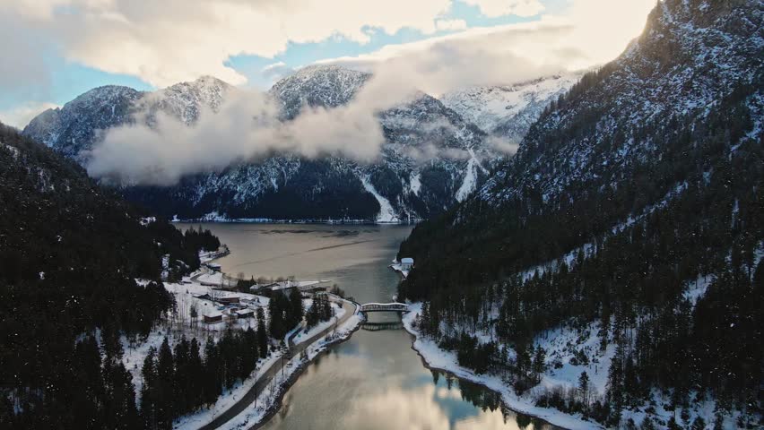 Aerial view of lake and snowy mountains, Austria.
