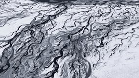 Aerial view of braided rivers in snow, Iceland. - Powered by Shutterstock - Get 15% off with code: PIKWIZARD15