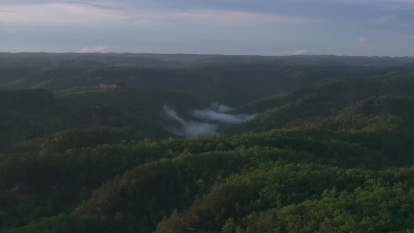 Aerial view of misty Appalachian hills, Red River Gorge, tranquil morning