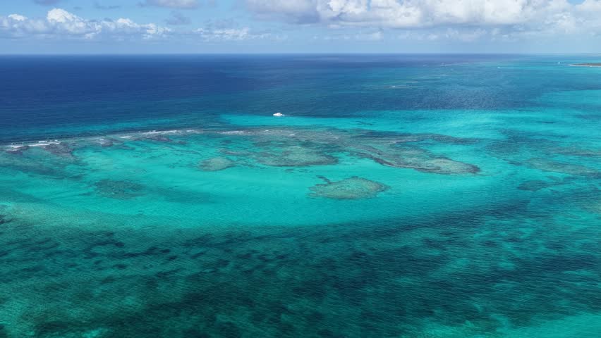 Grace Bay Beach At Providenciales In Overseas Territory Turks And Caicos Islands. Seascape Skyline. Downtown Landscape. Summer Travel. Grace Bay Beach In Turks And Caicos Islands. Highrise Buildings