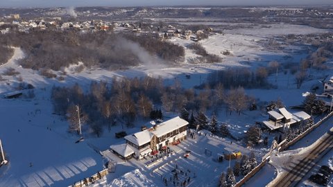 Drone Rising Backward over Winter Ski Resort