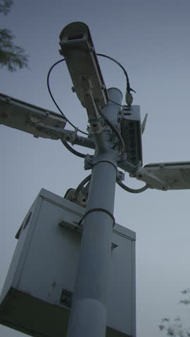 tall pole with multiple cameras, surveillance infrastructure for comprehensive city monitoring and safety