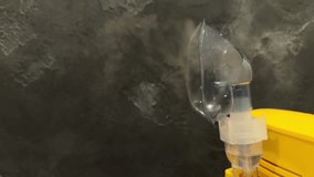 Compressor Nebulizer With Inhalation Mask Continuously Releases Medicinal Mist Against Black Background. Home Respiratory Therapy For Asthma Cold Flu And Breathing Support In Daily Healthcare Routine - Powered by Shutterstock - Get 15% off with code: PIKWIZARD15