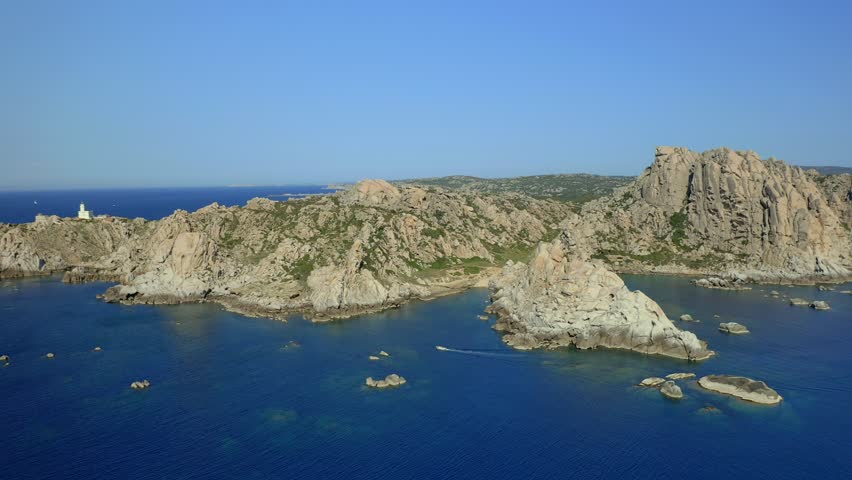 Drone aerial view of Capo Testa cape lighthouse and Valle della Luna beach in Sardinia, Italy