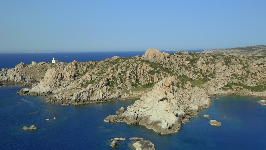 Drone aerial view of Capo Testa cape lighthouse and Valle della Luna beach in Sardinia, Italy