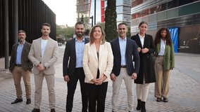 A determined group of professionals standing confidently together, representing collaboration and teamwork in a corporate setting, showcasing unity and shared purpose among diverse individuals. - Powered by Shutterstock - Get 15% off with code: PIKWIZARD15