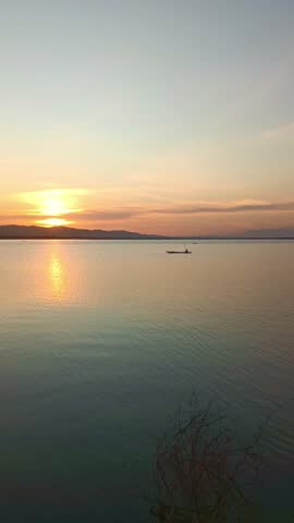 Scenic Sunset Over Calm Lake Water. Time lapse