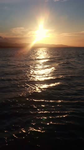 Sunset Over Lake Water Landscape. Sunset view at Lake Limboto, Gorontalo, Indonesia