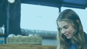 Woman tapping smartphone at cafe, revealing AR icons and numbers showing app data on cup. Technology, augmented, reality, interface, device, coffeehouse, pastry - Powered by Shutterstock - Get 15% off with code: PIKWIZARD15