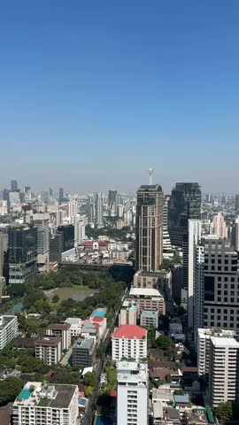 Vertical Bangkok Thailand skyline skyscrapers scene in Southeast Asia with modern high-rise architecture urban cityscape views