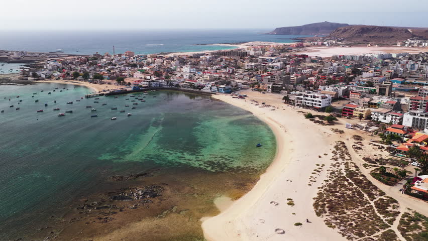 Sal Rei city aerial view, Old city with many colorful house, turquoise ocean and sandy beach, background the desert,Boa Vista, Cape Verde