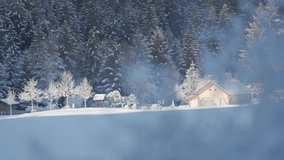 A serene winter landscape featuring a snow-covered meadow, a wooden hut, and frost-laden trees set against a backdrop of tall coniferous forest. - Powered by Shutterstock - Get 15% off with code: PIKWIZARD15