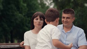 male female love son child, happy family, people hugging park, happy people park, man woman hugging child sitting bench park, little child son hugging mother father, smile laughter people faces female - Powered by Shutterstock - Get 15% off with code: PIKWIZARD15