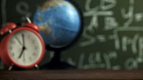 Notebooks and pens fall on the school desk. Filmed on a high-speed camera at 1000 fps. High quality FullHD footage - Powered by Shutterstock - Get 15% off with code: PIKWIZARD15