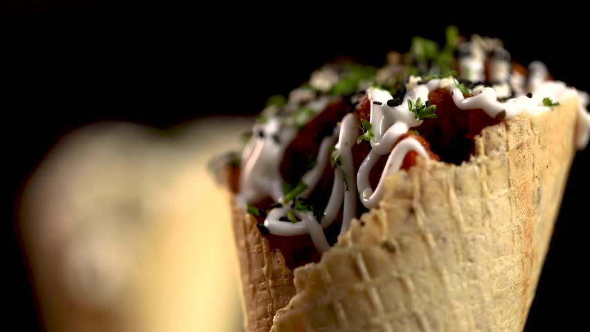  shift focus shot of chicken mac and cheese waffle. Delicious cheese waffle.
