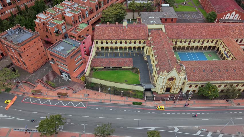 Aerial view of historic Bogota school building with sports fields