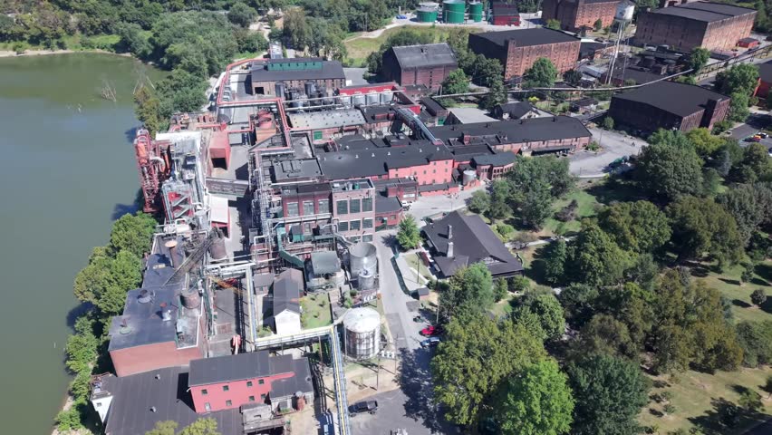 Aerial Flyover Of Buildings At The Buffalo Trace Whiskey Distillery In Frankfort, Kentucky, USA.