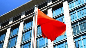 China’s national flag waving in front of a modern business building on 04 December 2025. Suitable for themes related to architecture, culture, economy, and international concepts. - Powered by Shutterstock - Get 15% off with code: PIKWIZARD15