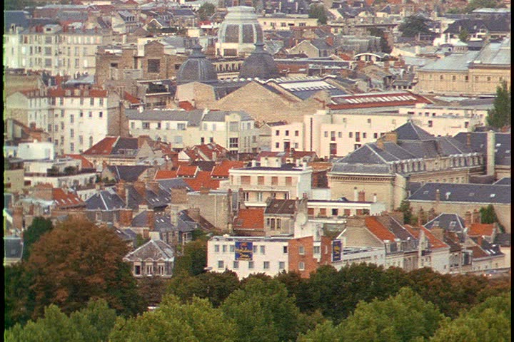 High angle shot of city of Reims; WS rooftops, camera pans left to WS exterior of Reims Cathedral  in Reims, France.