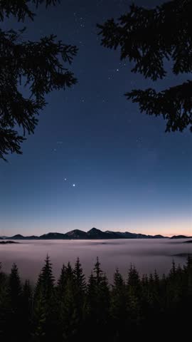 Blue Starry Night Sky Over Misty Mountains, Vertical Astronomy Time Lapse