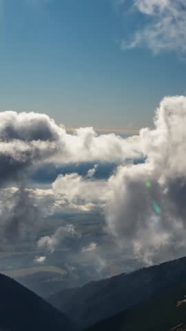 Dramatic Stormy Clouds Forming Over Mountains, Vertical Nature Time-Lapse