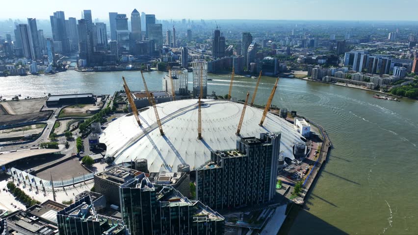 Aerial drone cinematic video of iconic O2 Arena in North Greenwich Peninsula, London, United Kingdom