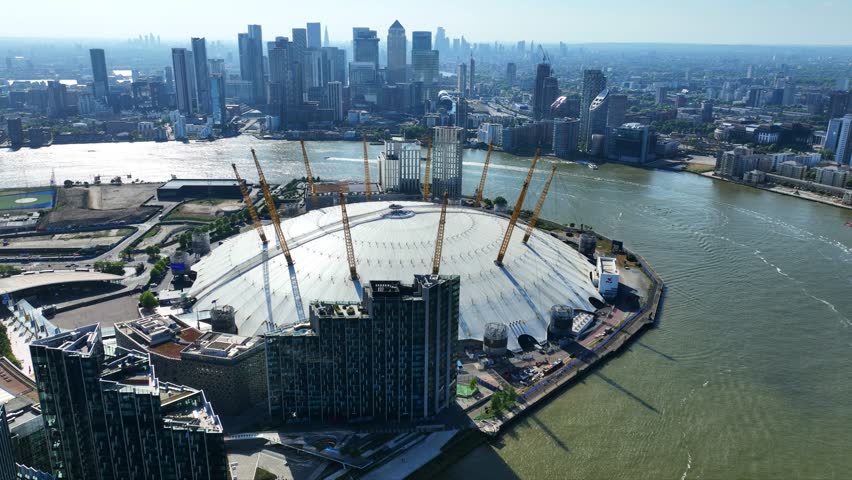 Aerial drone cinematic video of iconic O2 Arena in North Greenwich Peninsula, London, United Kingdom