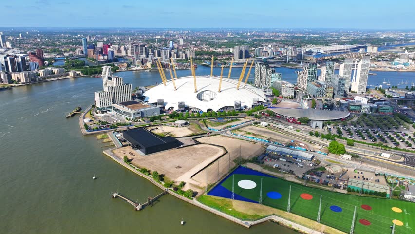 Aerial drone cinematic video of iconic O2 Arena in North Greenwich Peninsula, London, United Kingdom