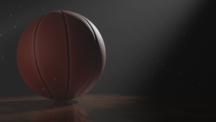 A basketball rotates in a seamless loop under a sharp spotlight, volumetric light scattering through the dark atmosphere. Strong shadows and detailed texture create a cinematic, intense sports visual.