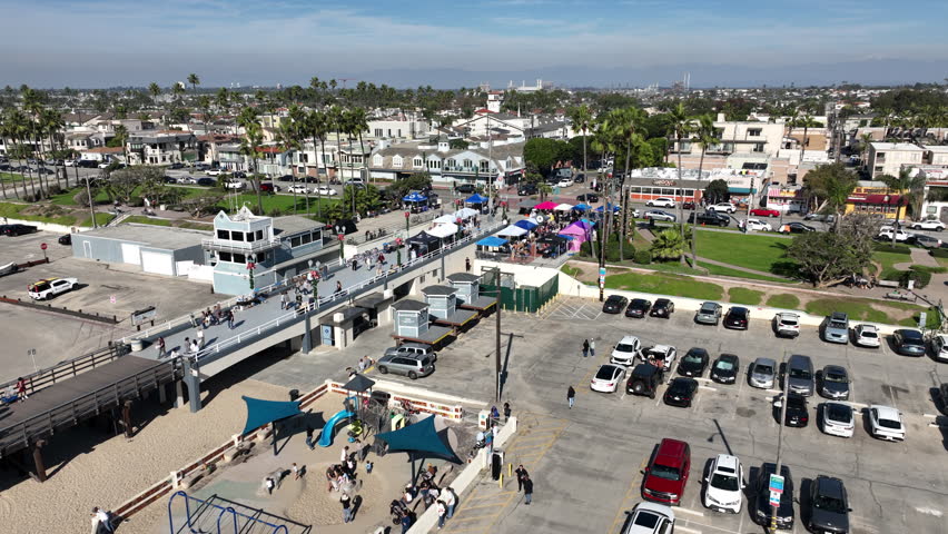 Seal Beach, California, Orange County USA - Aerial View of the Beach and Beachfront Businesses on a Sunny Day and Seal Beach Pier During Christmas Time