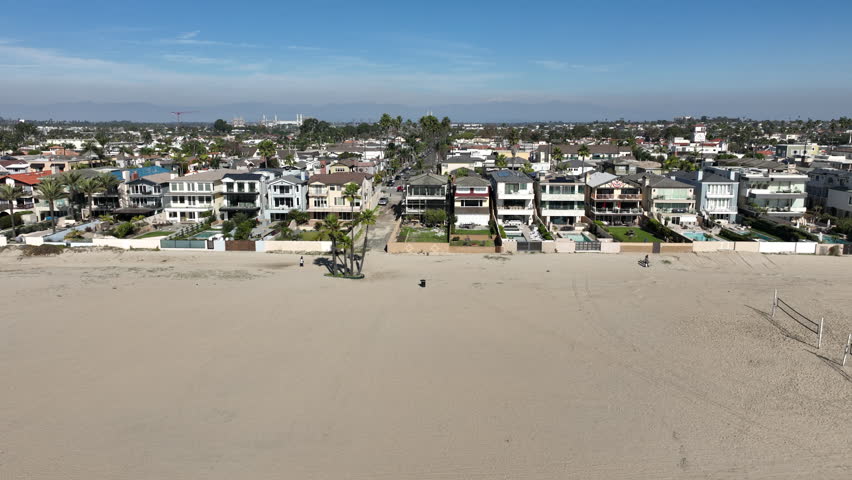 Seal Beach, California, USA - Aerial View of a Sandy Beach and Beachfront Homes on a Sunny Day in Orange County