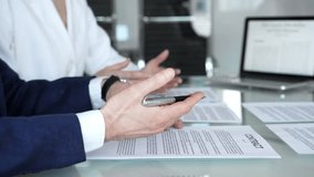 Business people collaborating on financial data analysis, reviewing growth charts on a laptop and printed reports during an important office meeting - Powered by Shutterstock - Get 15% off with code: PIKWIZARD15