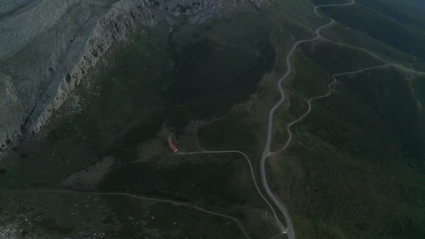 Aerial drone view of Siniscola Punta Gurturjos and Monte Albo Baronie mountain landscape with a road at sunset in Sardinia, Italy